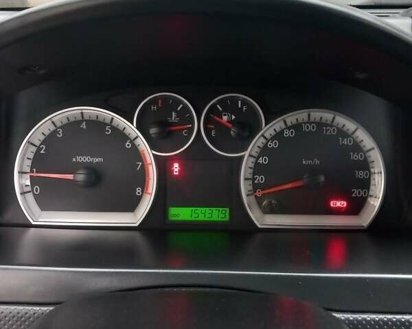 Серый Шевроле Авео, объемом двигателя 1.5 л и пробегом 154 тыс. км за 3900 $, фото 3 на Automoto.ua