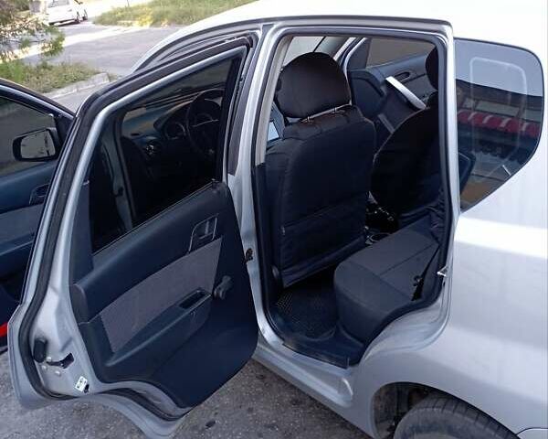 Серый Шевроле Авео, объемом двигателя 1.4 л и пробегом 160 тыс. км за 3700 $, фото 6 на Automoto.ua