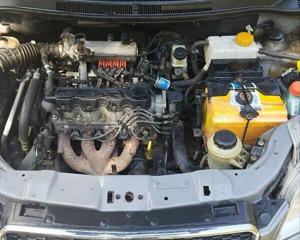 Серый Шевроле Авео, объемом двигателя 1.5 л и пробегом 150 тыс. км за 4200 $, фото 11 на Automoto.ua