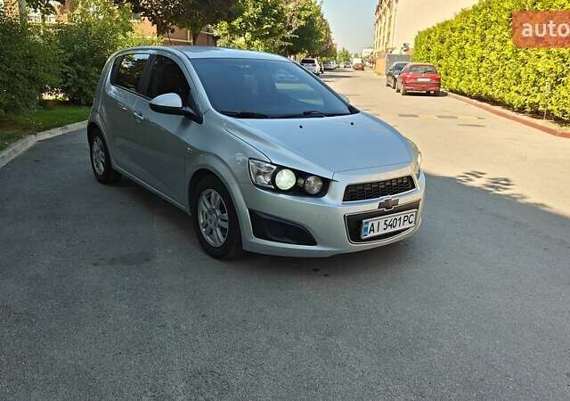 Серый Шевроле Авео, объемом двигателя 1.2 л и пробегом 249 тыс. км за 4600 $, фото 3 на Automoto.ua