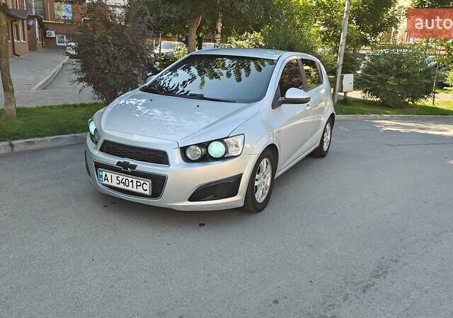 Серый Шевроле Авео, объемом двигателя 1.2 л и пробегом 249 тыс. км за 4600 $, фото 1 на Automoto.ua