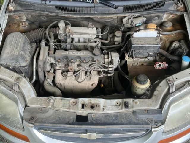 Серый Шевроле Авео, объемом двигателя 1.5 л и пробегом 260 тыс. км за 1600 $, фото 4 на Automoto.ua