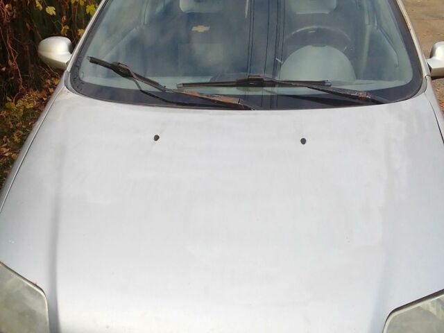 Серый Шевроле Авео, объемом двигателя 1.5 л и пробегом 430 тыс. км за 2000 $, фото 1 на Automoto.ua