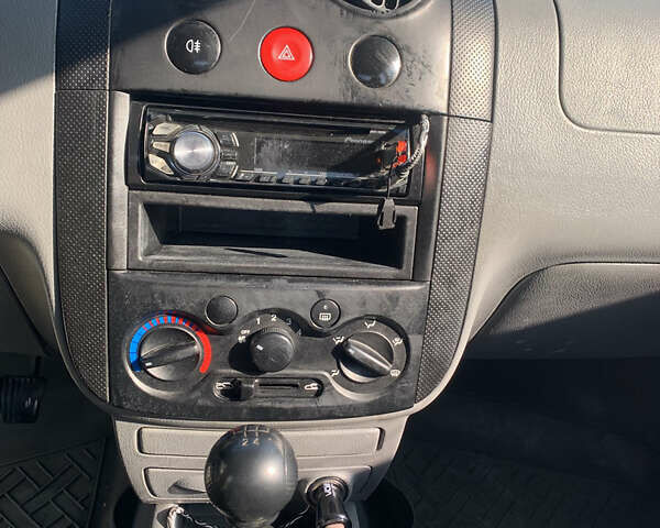 Сірий Шевроле Авео, об'ємом двигуна 1.5 л та пробігом 292 тис. км за 2899 $, фото 14 на Automoto.ua