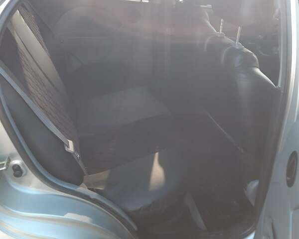 Серый Шевроле Авео, объемом двигателя 1.5 л и пробегом 320 тыс. км за 2000 $, фото 7 на Automoto.ua