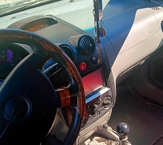 Серый Шевроле Авео, объемом двигателя 1.5 л и пробегом 333 тыс. км за 4000 $, фото 5 на Automoto.ua