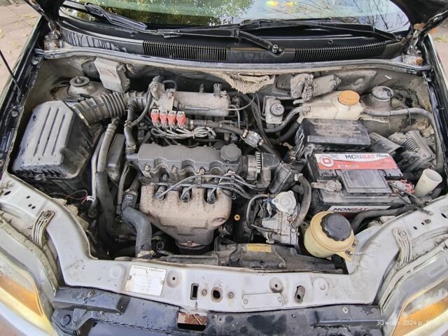 Серый Шевроле Авео, объемом двигателя 1.5 л и пробегом 350 тыс. км за 2500 $, фото 4 на Automoto.ua