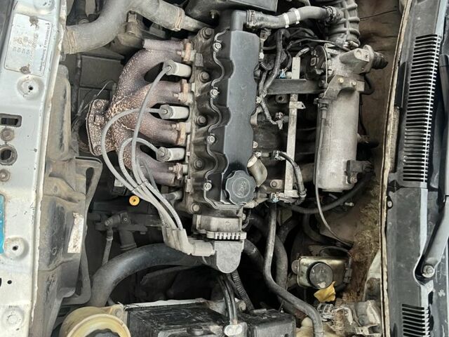 Серый Шевроле Авео, объемом двигателя 1.5 л и пробегом 320 тыс. км за 1193 $, фото 2 на Automoto.ua