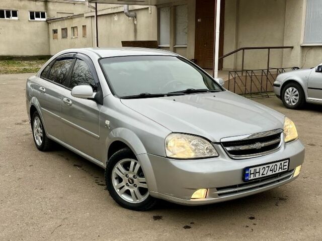 Серый Шевроле Авео, объемом двигателя 1.8 л и пробегом 258 тыс. км за 1500 $, фото 2 на Automoto.ua