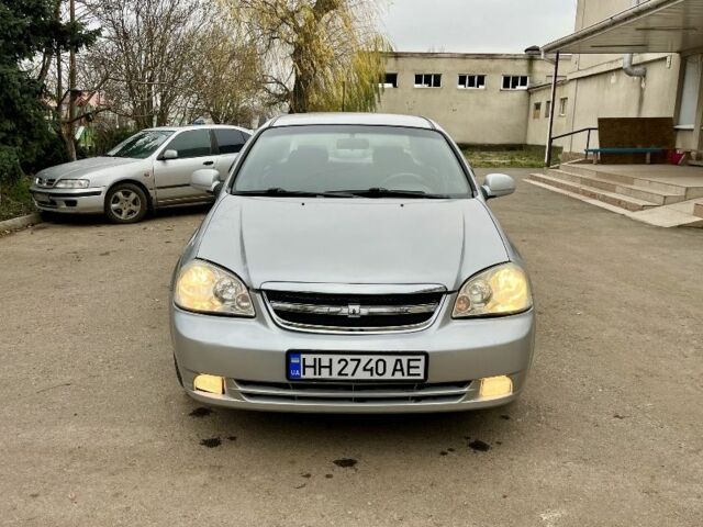 Серый Шевроле Авео, объемом двигателя 1.8 л и пробегом 258 тыс. км за 1500 $, фото 1 на Automoto.ua