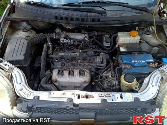 Серый Шевроле Авео, объемом двигателя 1.5 л и пробегом 260 тыс. км за 1550 $, фото 3 на Automoto.ua