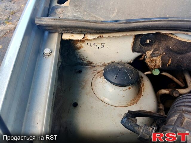 Серый Шевроле Авео, объемом двигателя 1.6 л и пробегом 177 тыс. км за 3200 $, фото 8 на Automoto.ua