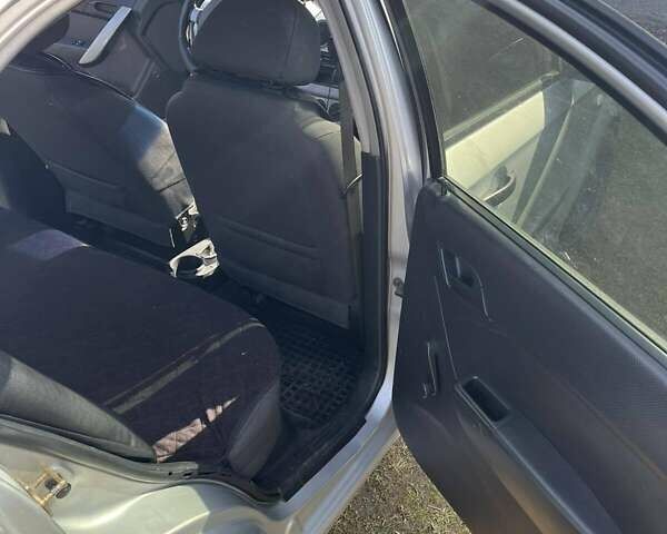 Серый Шевроле Авео, объемом двигателя 1.5 л и пробегом 245 тыс. км за 3200 $, фото 12 на Automoto.ua