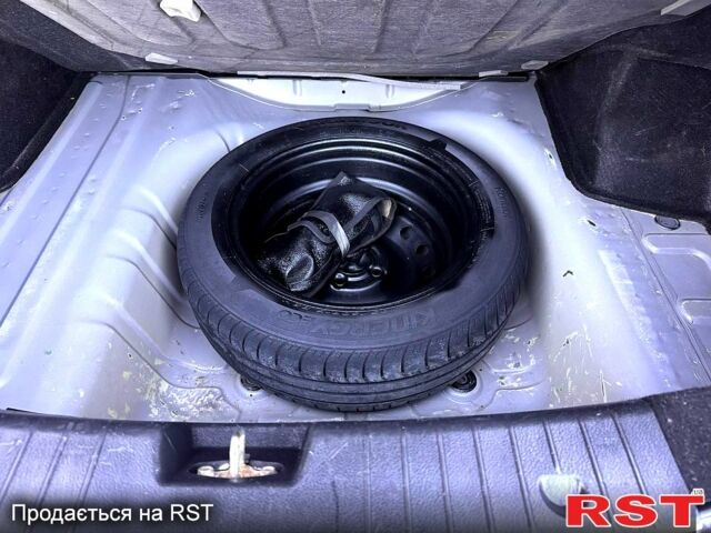 Серый Шевроле Авео, объемом двигателя 1.5 л и пробегом 205 тыс. км за 4300 $, фото 1 на Automoto.ua