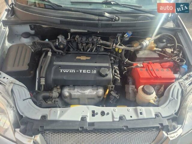 Серый Шевроле Авео, объемом двигателя 1.6 л и пробегом 180 тыс. км за 3900 $, фото 1 на Automoto.ua