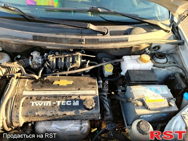 Серый Шевроле Авео, объемом двигателя 1.6 л и пробегом 265 тыс. км за 2700 $, фото 6 на Automoto.ua
