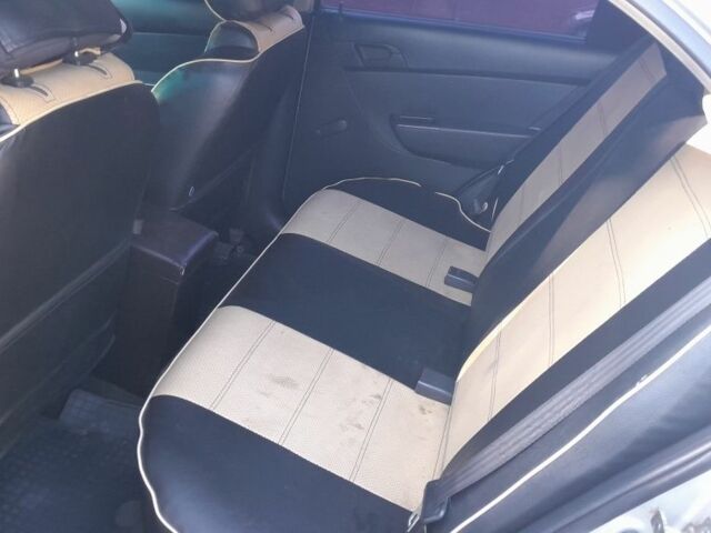 Серый Шевроле Авео, объемом двигателя 1.5 л и пробегом 245 тыс. км за 3400 $, фото 7 на Automoto.ua