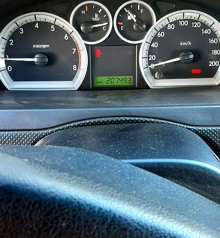 Серый Шевроле Авео, объемом двигателя 1.6 л и пробегом 207 тыс. км за 4200 $, фото 3 на Automoto.ua