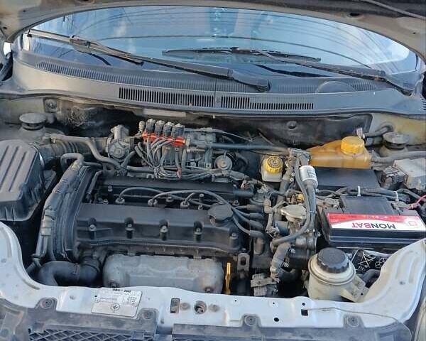 Сірий Шевроле Авео, об'ємом двигуна 1.6 л та пробігом 240 тис. км за 4000 $, фото 37 на Automoto.ua