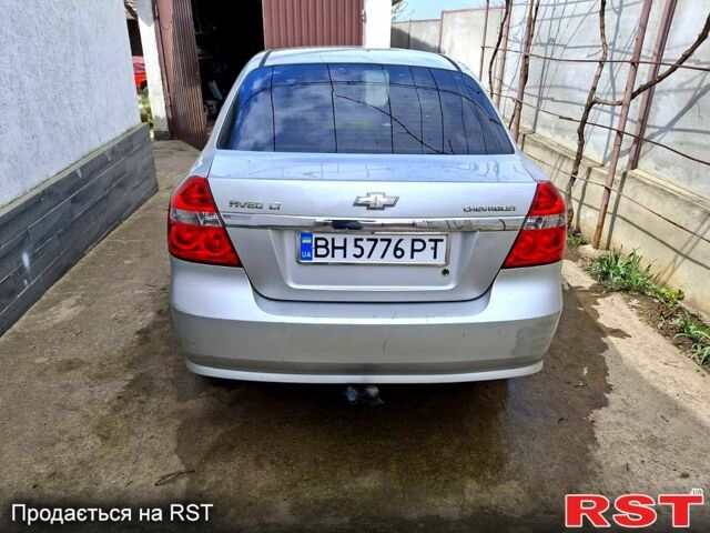 Серый Шевроле Авео, объемом двигателя 1.6 л и пробегом 259 тыс. км за 3900 $, фото 1 на Automoto.ua