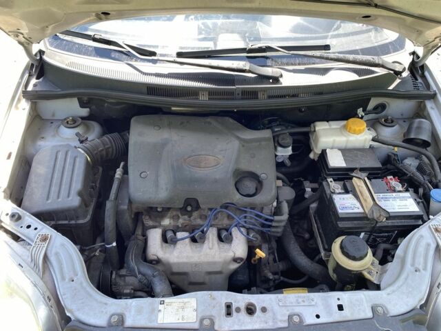 Серый Шевроле Авео, объемом двигателя 1.5 л и пробегом 263 тыс. км за 3700 $, фото 4 на Automoto.ua