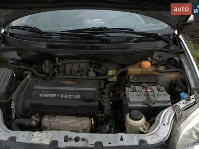 Серый Шевроле Авео, объемом двигателя 1.6 л и пробегом 156 тыс. км за 4000 $, фото 1 на Automoto.ua