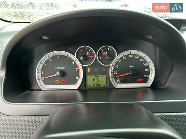 Серый Шевроле Авео, объемом двигателя 1.5 л и пробегом 317 тыс. км за 3500 $, фото 2 на Automoto.ua