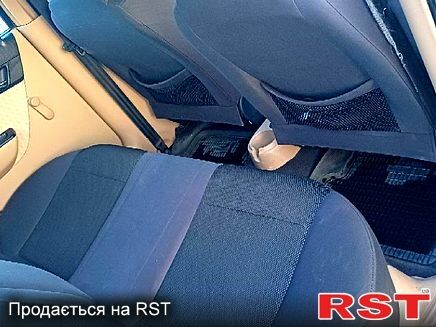 Серый Шевроле Авео, объемом двигателя 1.6 л и пробегом 200 тыс. км за 3700 $, фото 4 на Automoto.ua