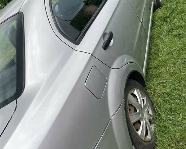 Серый Шевроле Авео, объемом двигателя 1.5 л и пробегом 210 тыс. км за 3800 $, фото 4 на Automoto.ua