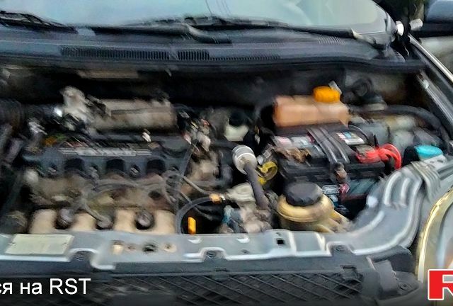 Серый Шевроле Авео, объемом двигателя 1.5 л и пробегом 205 тыс. км за 3500 $, фото 2 на Automoto.ua