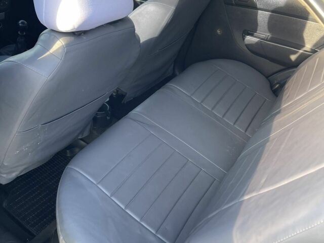 Серый Шевроле Авео, объемом двигателя 1.5 л и пробегом 300 тыс. км за 2350 $, фото 3 на Automoto.ua