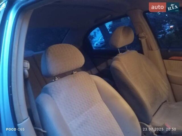 Серый Шевроле Авео, объемом двигателя 1.6 л и пробегом 250 тыс. км за 2900 $, фото 1 на Automoto.ua