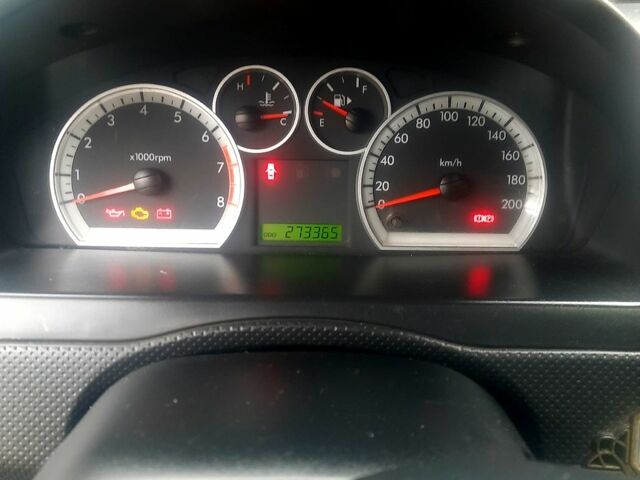 Серый Шевроле Авео, объемом двигателя 1.5 л и пробегом 273 тыс. км за 2600 $, фото 1 на Automoto.ua