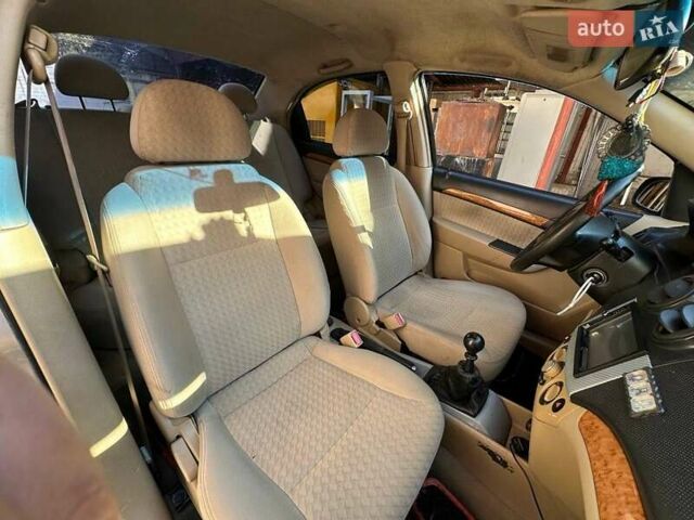 Серый Шевроле Авео, объемом двигателя 1.6 л и пробегом 134 тыс. км за 2900 $, фото 2 на Automoto.ua