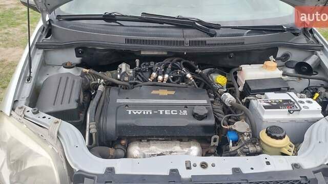 Серый Шевроле Авео, объемом двигателя 1.6 л и пробегом 282 тыс. км за 3500 $, фото 2 на Automoto.ua