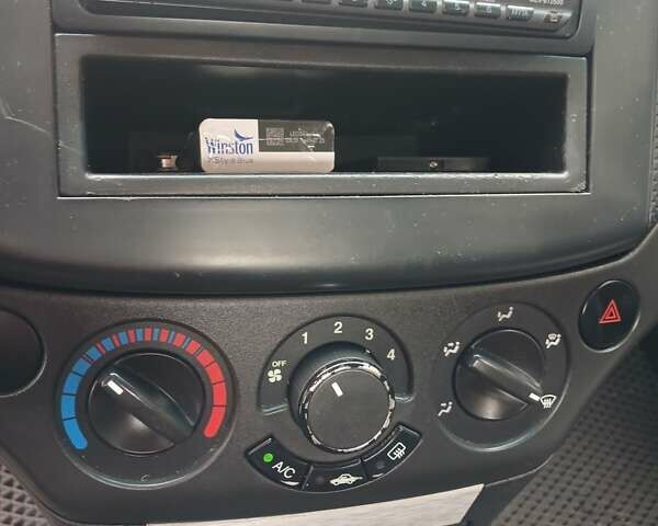 Сірий Шевроле Авео, об'ємом двигуна 1.5 л та пробігом 275 тис. км за 2350 $, фото 13 на Automoto.ua