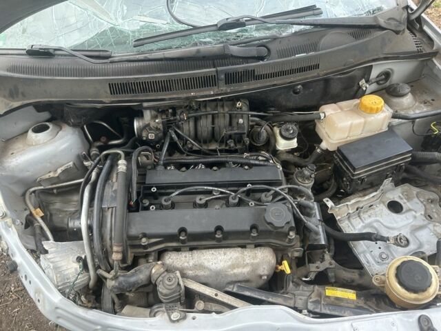 Серый Шевроле Авео, объемом двигателя 1.4 л и пробегом 175 тыс. км за 1499 $, фото 6 на Automoto.ua