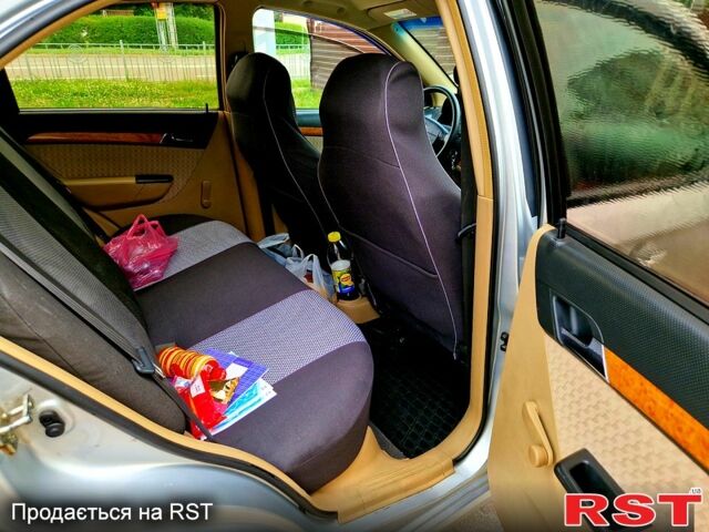 Сірий Шевроле Авео, об'ємом двигуна 1.6 л та пробігом 220 тис. км за 4200 $, фото 8 на Automoto.ua