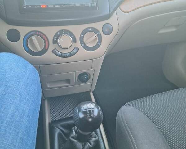 Сірий Шевроле Авео, об'ємом двигуна 1.6 л та пробігом 76 тис. км за 5300 $, фото 27 на Automoto.ua