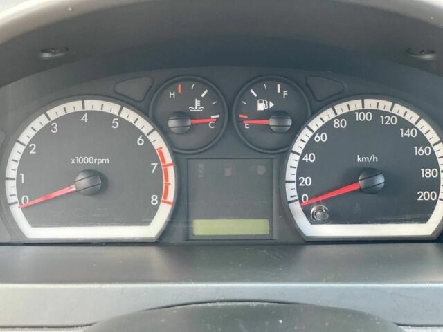 Серый Шевроле Авео, объемом двигателя 1.4 л и пробегом 180 тыс. км за 3899 $, фото 4 на Automoto.ua