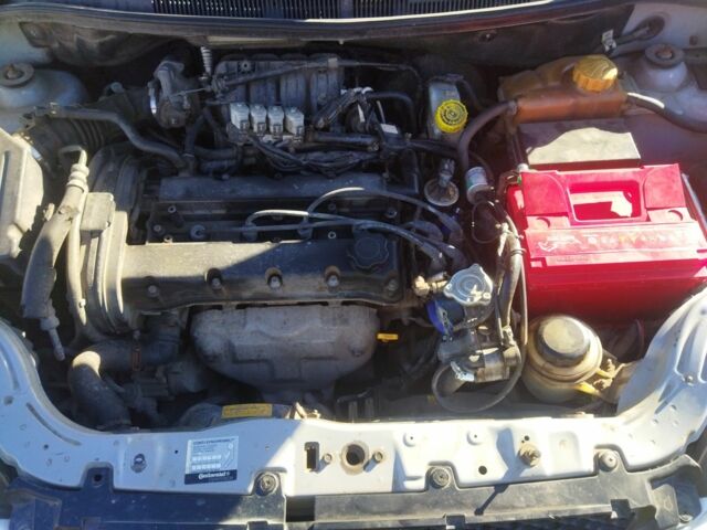 Серый Шевроле Авео, объемом двигателя 1.6 л и пробегом 230 тыс. км за 3400 $, фото 5 на Automoto.ua