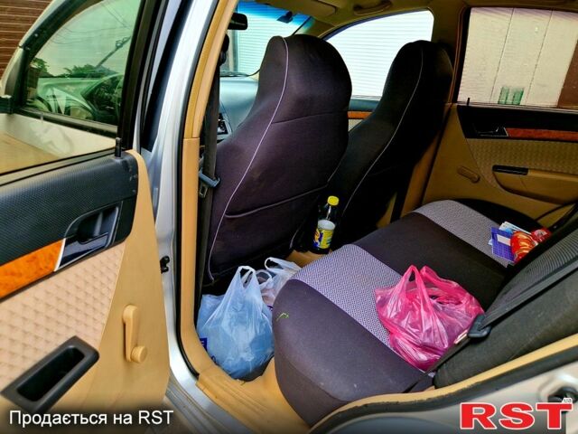 Сірий Шевроле Авео, об'ємом двигуна 1.6 л та пробігом 220 тис. км за 4200 $, фото 10 на Automoto.ua