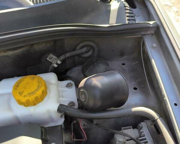 Серый Шевроле Авео, объемом двигателя 1.5 л и пробегом 142 тыс. км за 4999 $, фото 2 на Automoto.ua