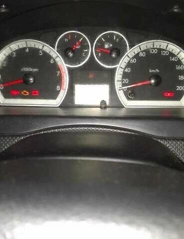 Серый Шевроле Авео, объемом двигателя 1.5 л и пробегом 218 тыс. км за 3950 $, фото 6 на Automoto.ua