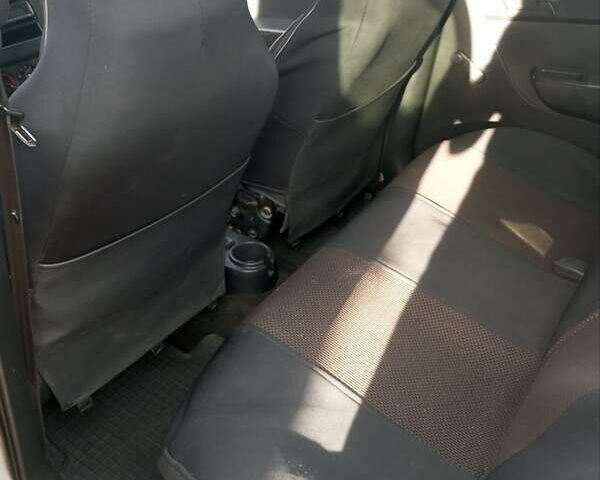 Сірий Шевроле Авео, об'ємом двигуна 1.5 л та пробігом 110 тис. км за 3900 $, фото 10 на Automoto.ua