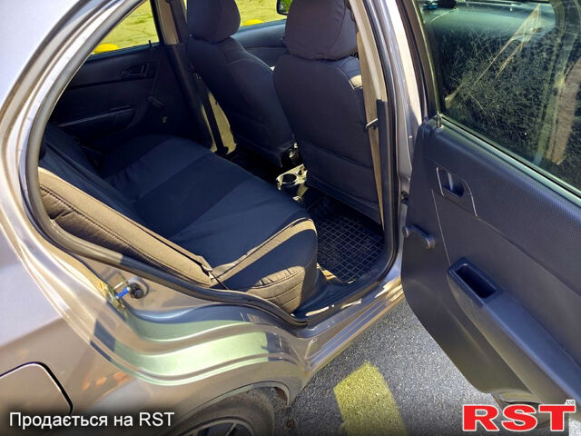 Серый Шевроле Авео, объемом двигателя 1.5 л и пробегом 228 тыс. км за 4500 $, фото 10 на Automoto.ua