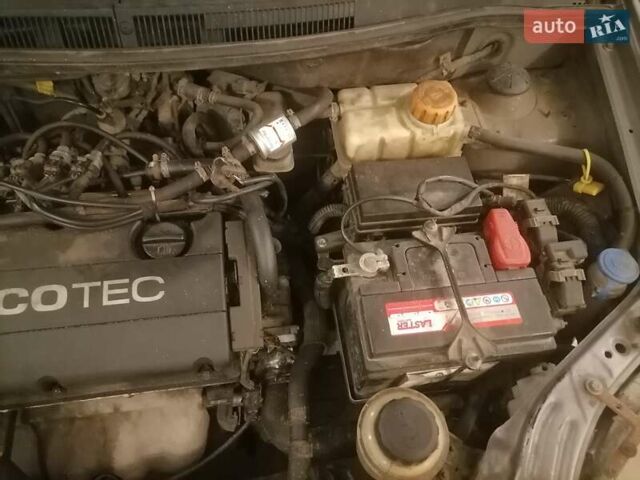 Серый Шевроле Авео, объемом двигателя 1.4 л и пробегом 265 тыс. км за 3400 $, фото 2 на Automoto.ua
