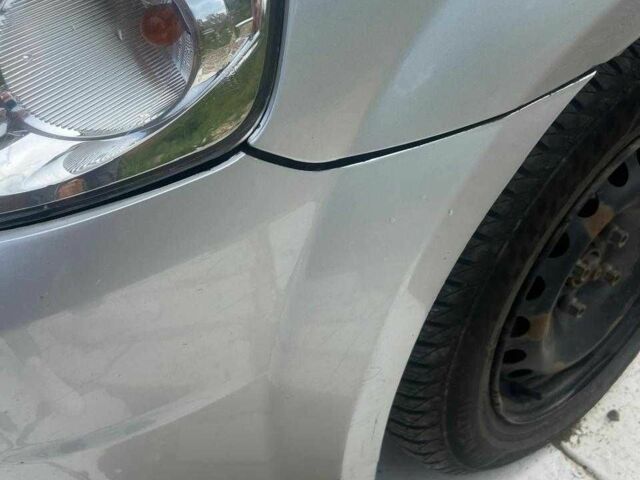 Серый Шевроле Авео, объемом двигателя 1.5 л и пробегом 175 тыс. км за 3450 $, фото 2 на Automoto.ua