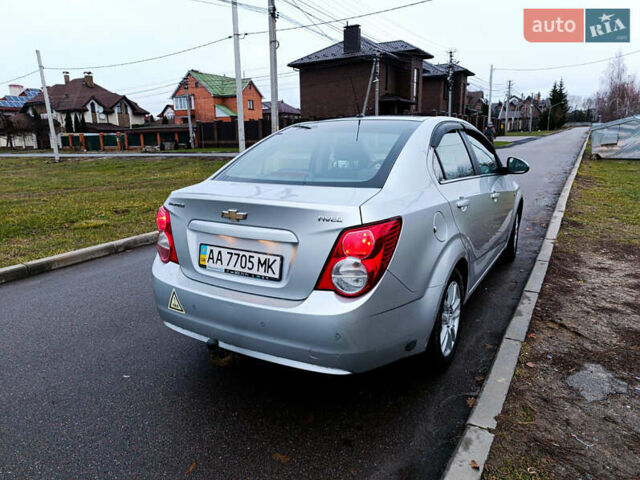 Серый Шевроле Авео, объемом двигателя 1.6 л и пробегом 143 тыс. км за 7000 $, фото 1 на Automoto.ua