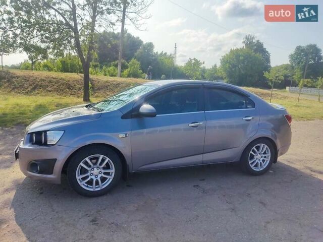 Серый Шевроле Авео, объемом двигателя 1.6 л и пробегом 150 тыс. км за 6800 $, фото 1 на Automoto.ua